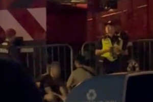 一名男子因涉嫌谦虚而被捕，另一名男子在新加坡大奖赛上发生口角后协助调查 