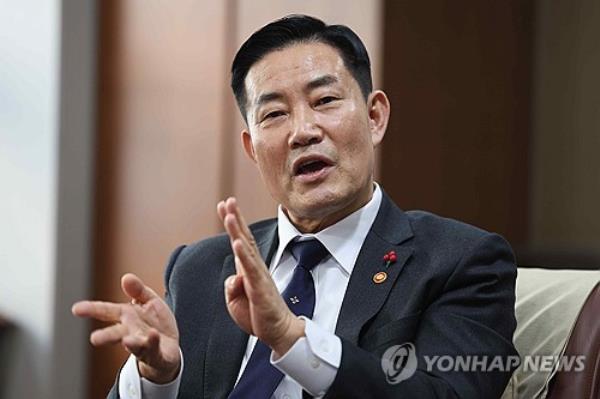 This file photo, taken Jan. 11, 2024, shows Defense Minister Shin Won-sik speaking in an interview at his office in central Seoul. (Yonhap)